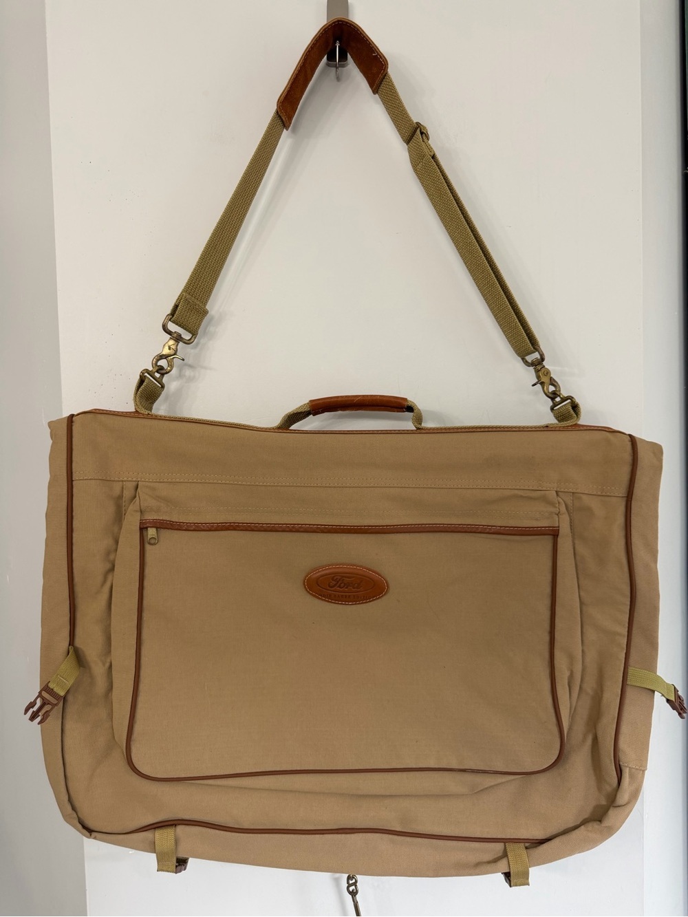Ford x Eddie Bauer folding portable travel leather and khaki canvas garment bag